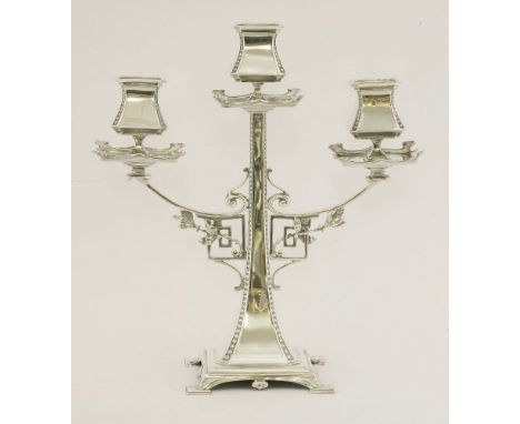 An Edwardian silver three-light candelabrum,by Walker & Hall, Sheffield 1910,of Art Nouveau style,32.8cm high, 29.7cm wide