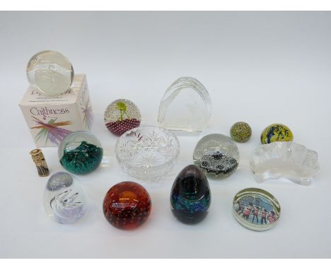 Twelve Dartington, Caithness and other paperweights, one in original box together with a bone netsuke