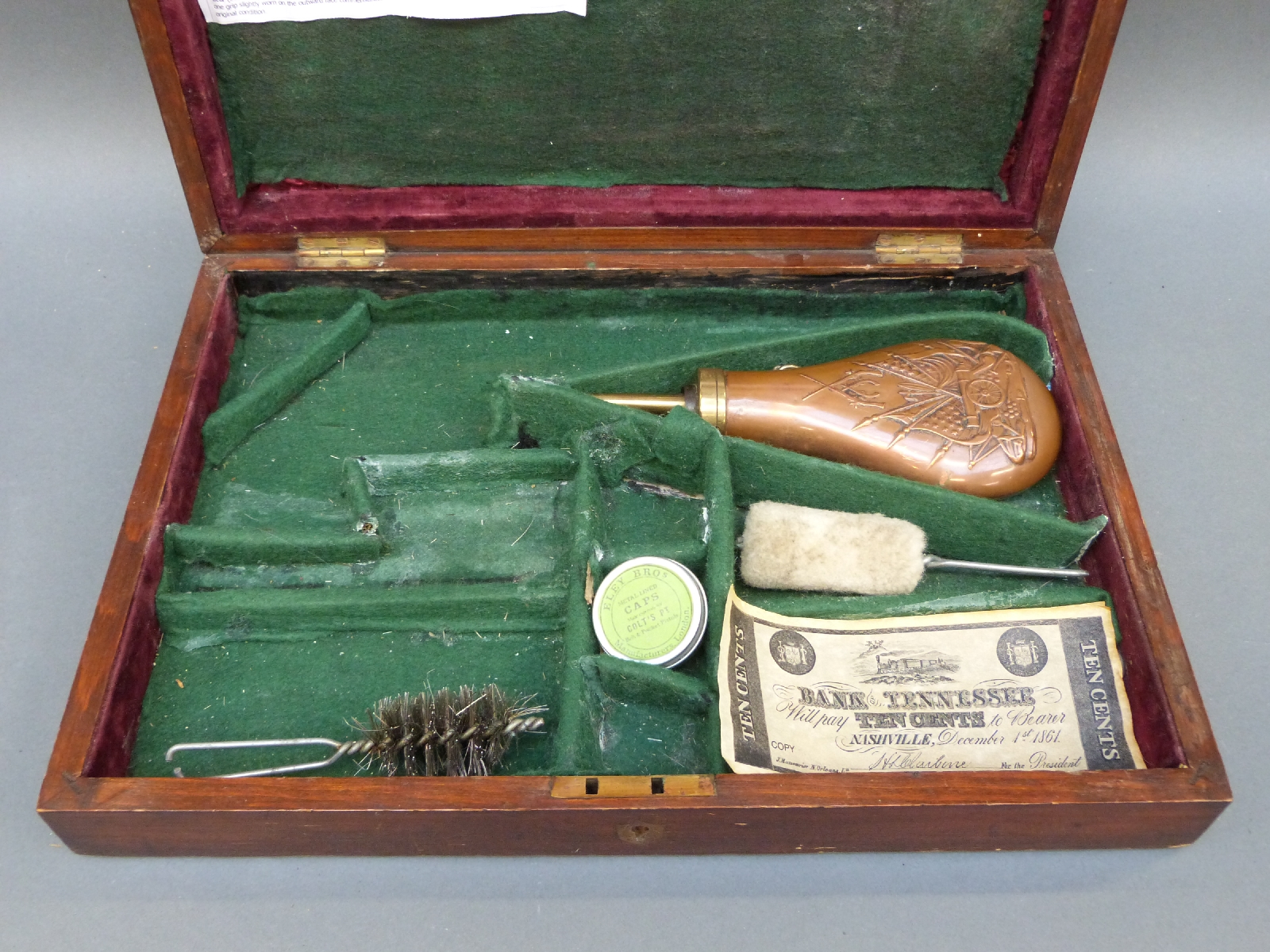A brass inlaid wooden pistol / revolver box with fitted felt lined