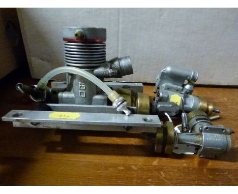 Two glow engines to suit radio control model boats both by OPS, one 12 the other 60 together with a vintage DC Ltd diesel eng
