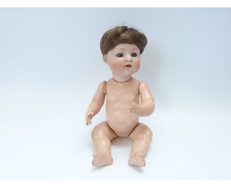 Baer & Proeschild bisque headed doll with open mouth, weighted blue eyes, short brown hair and jointed composition body, mark