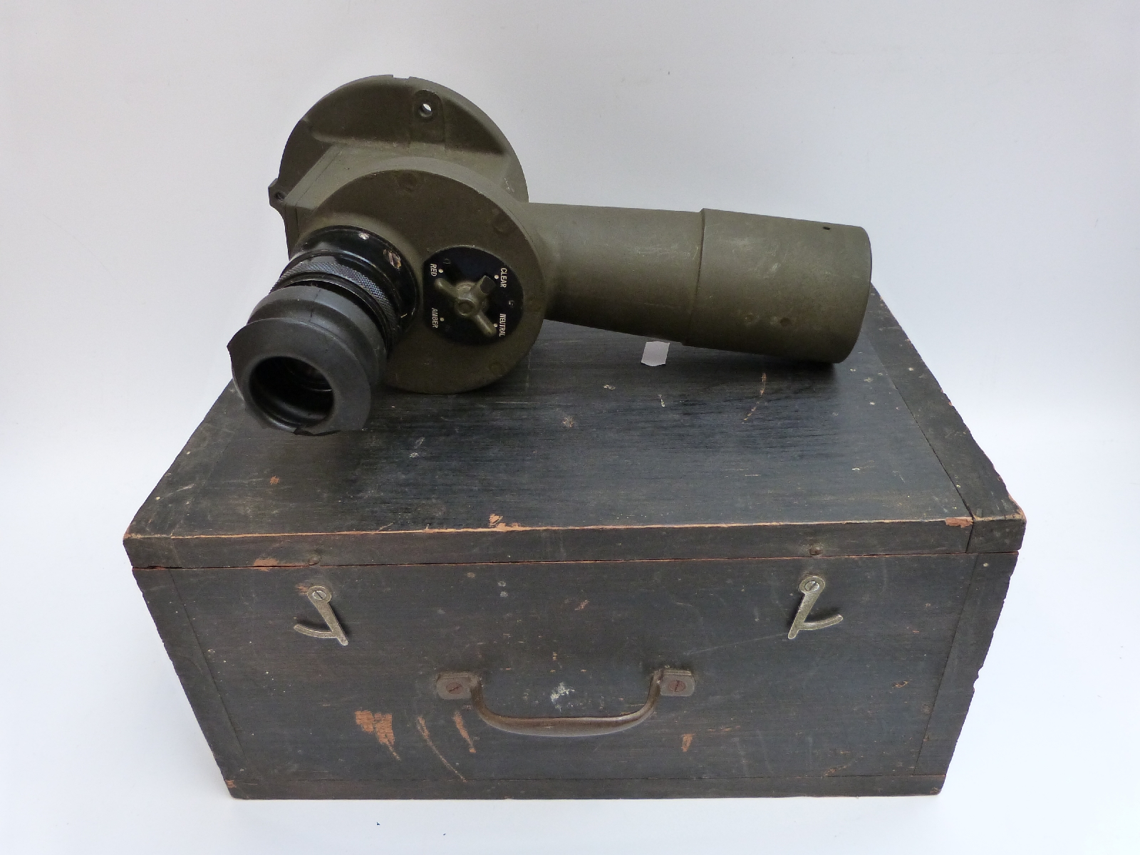 A WWII tank gun sight / periscope in case with three lenses