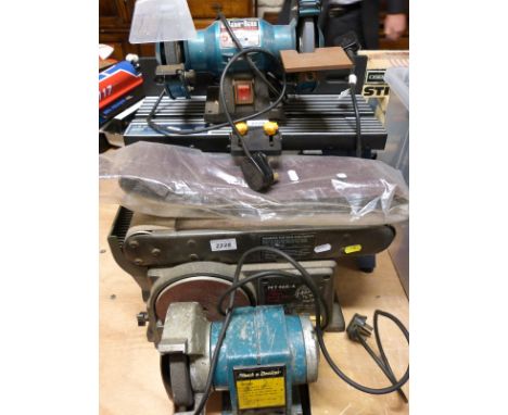 A belt and disk sander, bench grinder and a router table