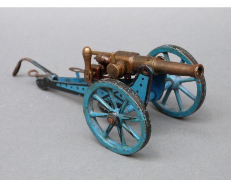 Marklin model cannon with trademark to the barrel, adjustable height and firing mechanism, overall length 17cm. 