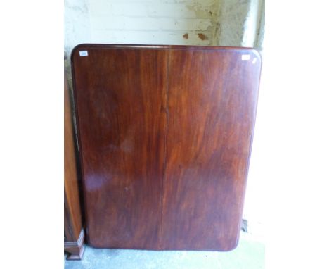 A 19thC mahogany tilt top table raised on tripod base (H74 x W123 x D86cm) 