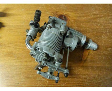 A four stroke radio control model aircraft engine