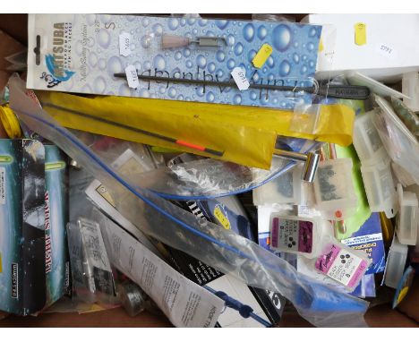A collection of fishing accessories including unopened scissors / tweezers, light sticks, disgorgers etc