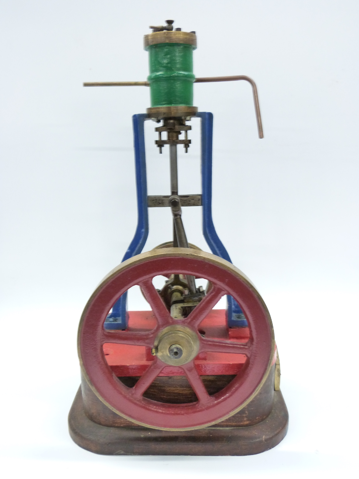 Live steam vertical 'A' frame steam engine mounted on wooden base with