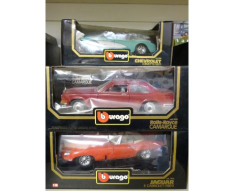 Five Burago 1:18 scale diecast model cars including Rolls-Royce, Bugatti, Porsche etc, all in original boxes