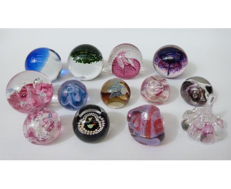 A collection of paperweights including Wedgwood and Caithness