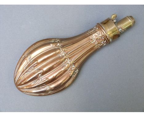 James Dixon & Sons copper and brass powder flask with embossed reeded decoration, 21cm long. 