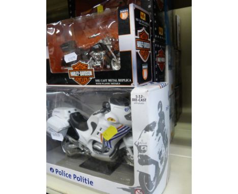 A collection of boxed diecast models including Corgi Classics, large scale model police cars, Chad Valley, Solido, Matchbox e