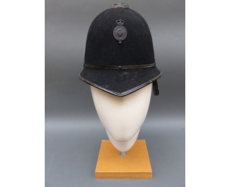 A vintage Royal Ulster Constabulary police helmet