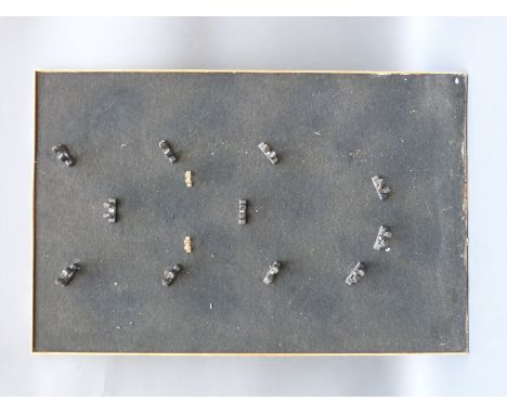 A purpose built powder flask display board with clips for 14 flasks. 