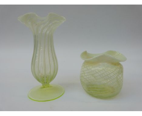 Two vaseline glass straw opal vases both with frilled rims, one on uranium glass foot, 26cm tall