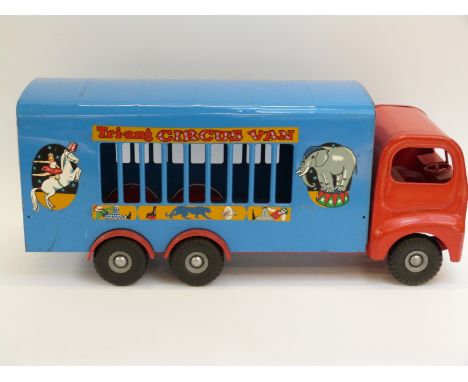 Tri-ang 300 series large scale pressed steel Circus Van with red cab, blue body and circus animal decals, 60cm long