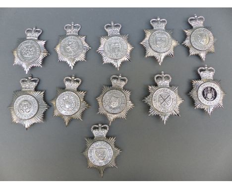 Ten police helmet badges including Shropshire, Liverpool and Bootle, Mid-Anglia Constabulary, Joint Norfolk, Gwynedd, West Su