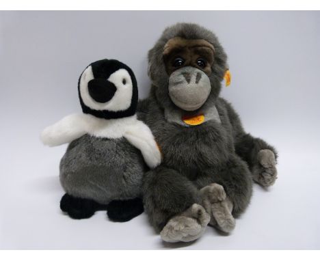 Two Steiff teddy bear animals Charly Penguin 057083 and Baby Gorilla 062070