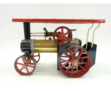 A Mamod T.E.1.A live steam traction engine with brass polished boiler and reversing lever