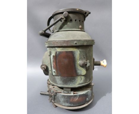 A Ministry mark copper Boer War period signalling lamp together with a photograph of the lamp with the Gloucestershire Regime