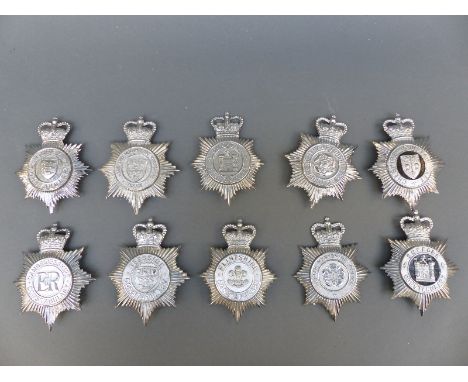 Ten police helmet badges including York North and East Yorkshire, Cambridgeshire Constabulary, Cheshire, Essex, Flintshire, T