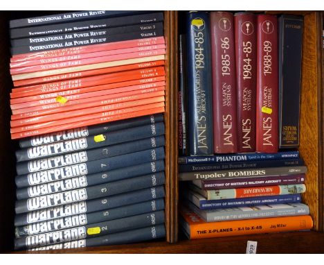 Approximately 50 aviation books mainly post WWII military including Jane's Weapon Systems, jets, Wings of Fame series etc