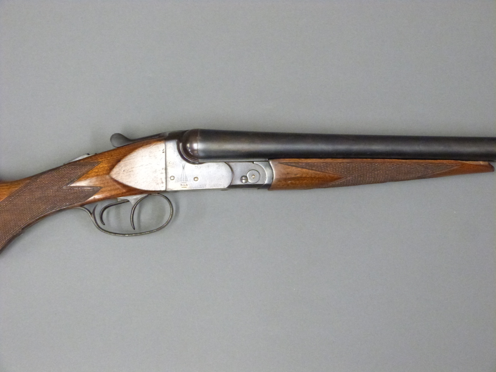 BSA 12 bore side by side shotgun with chequered semipistol grip and