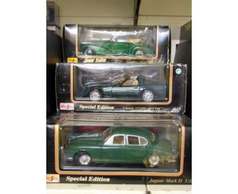 Six Maisto 1:18 scale diecast model cars including some special editions, all in original boxes