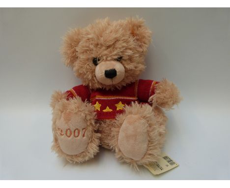 Steiff Original 'Cosy Year Bear' 2007, 662522, with apricot fur, with button to ear and tags, 28cm tall seated