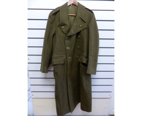 An army greatcoat marked size 8 and dated 1953 inside