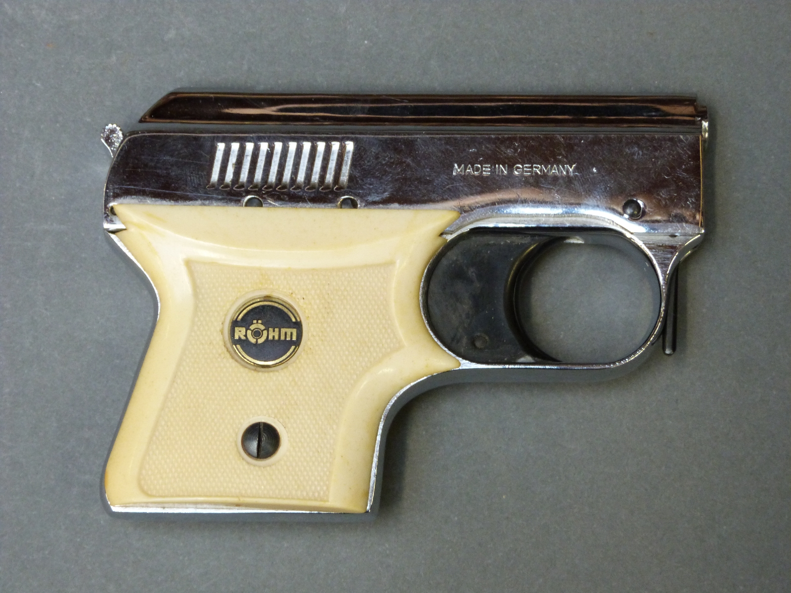 Rohm Rg 25 starting pistol with moulded cream grips, overall length 12cm