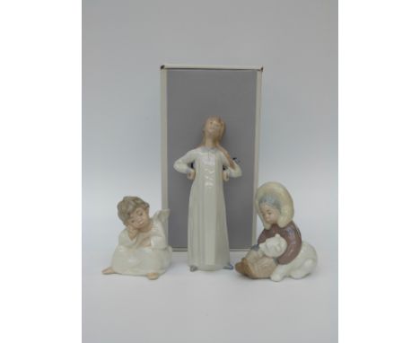 Four Lladro figures, one boxed