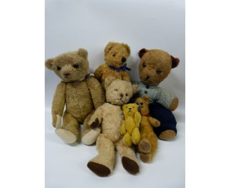 Six blonde teddy bears including a Steiff miniature example, some with growlers, largest 44cm tall