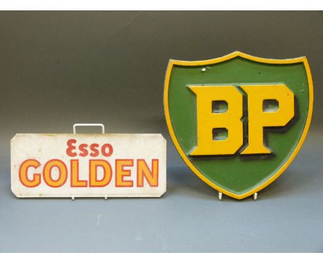Aluminium BP sign and an 'Esso Golden' petrol pump glass panel