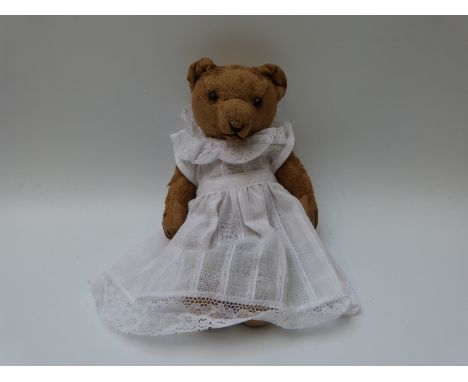 Blonde mohair teddy bear with hump back, central seam and jointed limbs, possibly Steiff, 29cm tall