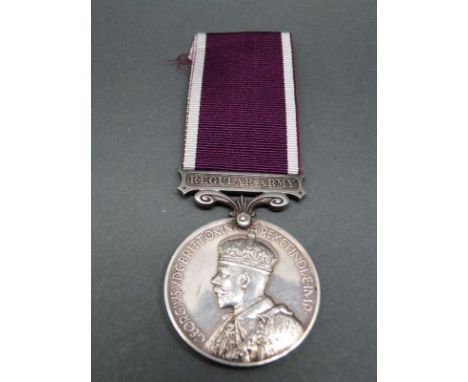 A George V regular army long service and good conduct medal awarded to 1020072 S. Sjt. T.W. Morris R.A.