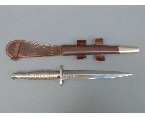 Wilkinson Sword Fairbairn-Sykes fighting knife with 17cm double edged blade etched 'Wilkinson Sword Made in England' and chro