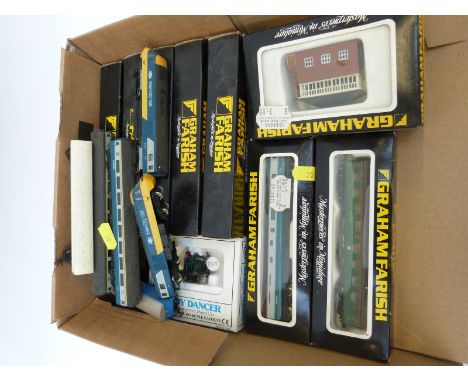 Fourteen Graham Farish, Bachmann and other N gauge locomotives, rolling stock and accessories, all in original boxes