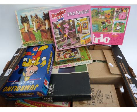 Over twenty various children's puzzles and games including student's microscope, Subbuteo etc. almost all in original boxes 