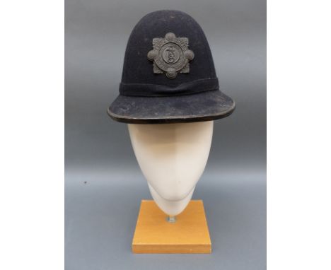 A vintage Irish police helmet