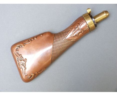 James Dixon & Sons copper and brass powder flask in the form of a gun stock with ornate scrolling and chequered decoration, s