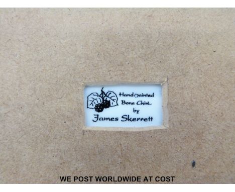 A porcelain plaque hand decorated with a polar bear by James Skerrett, ex Royal Worcester artist (12x17cm)