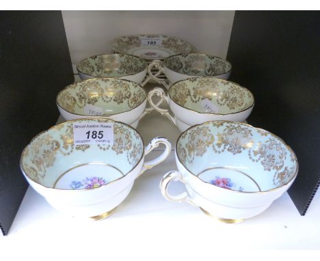 Six Paragon hand decorated cups and saucers