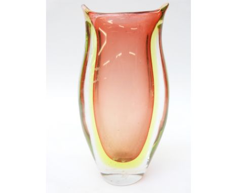 A double lined green over salmon pink vase, unsigned but in the style of Orrefors, 17.5cm tall