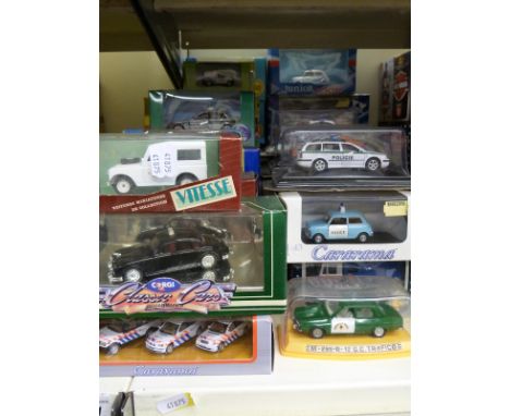 Lledo model police cars, 19 Lledo 1:43 scale models in boxes, ten Maisto Harley Davidson model motorcycles, mostly police rel