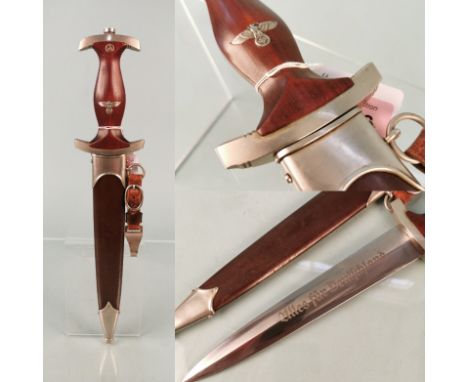 An S.A. Service dagger adopted 1933 by Tiger. This very good dagger also has single hanger marked (RZM) M5/71