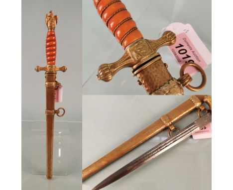 A very fine second model Navy (Kriegsmarine) Officer's dress dagger by W.K.C. A wonderful orange grip with pebbled scabbard m