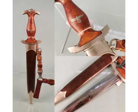 An S.A. Service dagger with erased ROHM inscription by Ernest Pack &amp; Son. This is an early example of the S.A. dagger tog