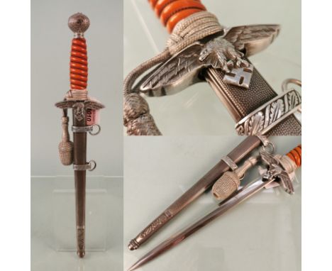 A second model (1937) Luftwaffe Officer's dress dagger by J.A. Henckels Solingen, complete with a set of D.R.G.M. marked hang