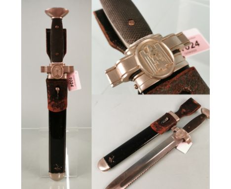 A German Red Cross (Deutsches Rotes Kreuz) subordinate hewer, with black painted scabbard and leather frog